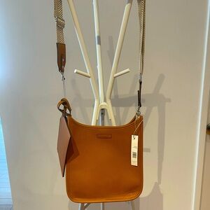 Crossbody bag with guitar strap, caramel/cognac brown, new with tags.